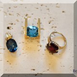 J07. Gold pendants and ring.